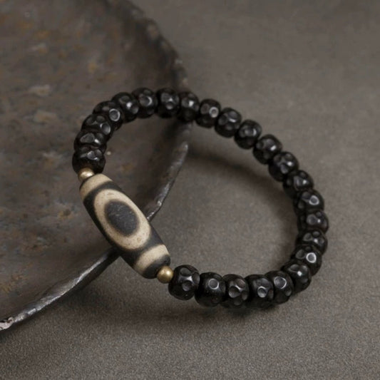 Pulsera de cuentas de coco negro con cuentas tibetanas Dzi