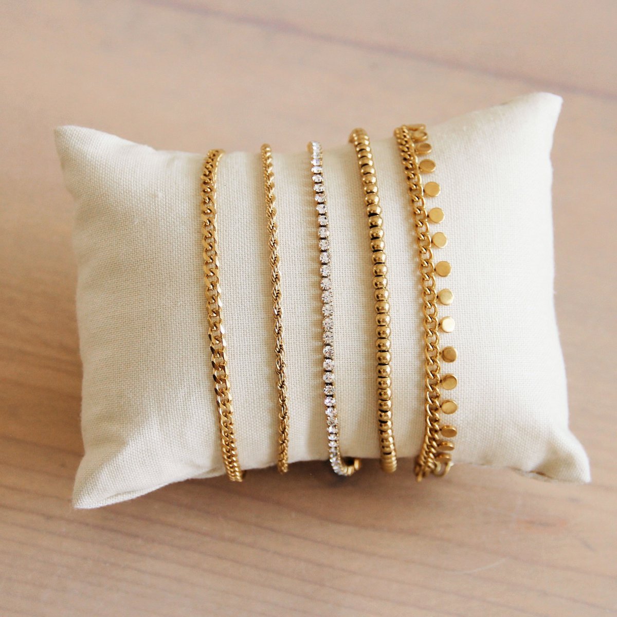 Stalen schakelarmband met balletjes - Goud