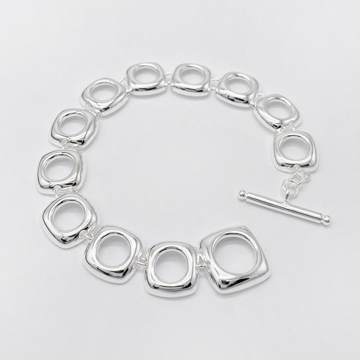 Stevige sterlingzilveren armband met gedurfde look en vierkante frameschakels met OT-gesp