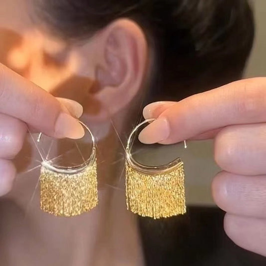 Uniek design dynamische oorbellen met kwastjes - goud en zilver